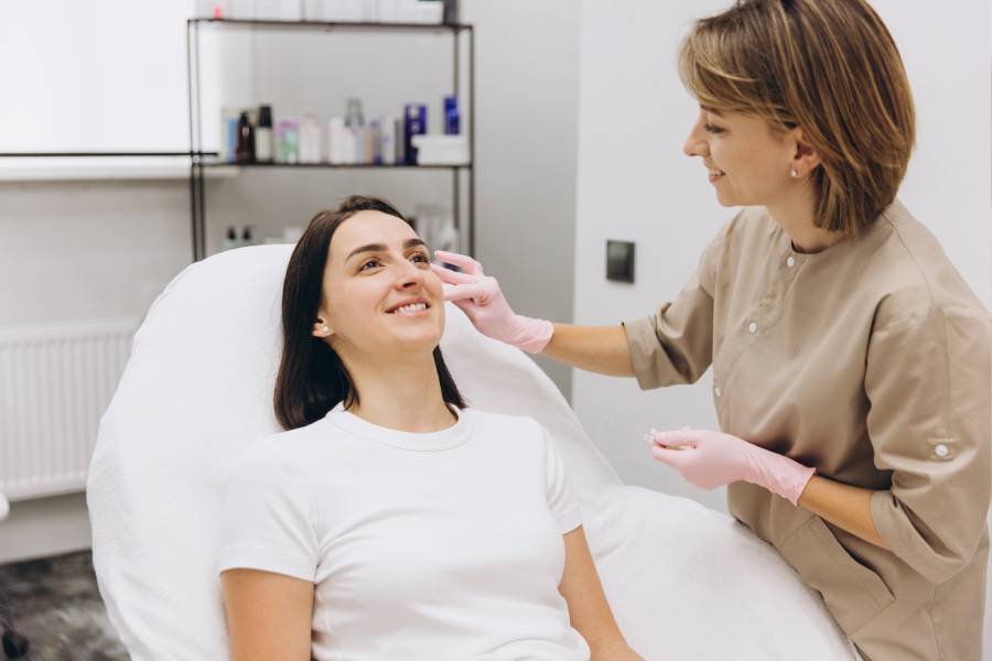 Preparing woman for fillers at the clinic